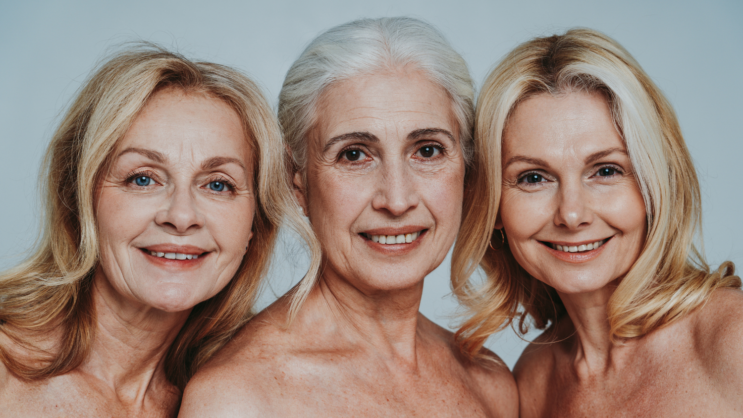 3 lady's between the ages of 50 to 70 smiling
