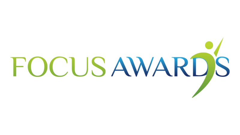 Logo of Focus Awards with a stylized figure on a white background